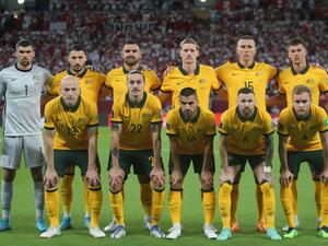 Australia's players pose for a group picture ahead of the FIFA World Cup 2022 inter-confederation play-offs match between Australia and Peru on June 13, 2022, at the Ahmed bin Ali Stadium in the Qatari city of Ar-Rayyan. (Photo by MUSTAFA ABUMUNES / AFP) Australia's players pose for a group picture ahead of the FIFA World Cup 2022 inter-confederation play-offs match between Australia and Peru on June 13, 2022, at the Ahmed bin Ali Stadium in the Qatari city of Ar-Rayyan. (Photo by MUSTAFA ABUMUNES / AFP)