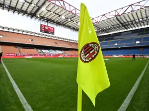 he logo of AC Milan is pictured on a corner flag prior to the Italian Serie A football match AC Milan vs Sassuolo at the San Siro stadium in Milan. AC Milan announced that its current owners, investment fund Elliot Advisors, have agreed to sell the newly-crowned Italian A champions to rival fund RedBird for 1.2 billion euros ($1.3 billion). (Photo by MIGUEL MEDINA / AFP) 