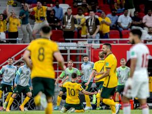 Australia's midfielder Ajdin Hrustic (C) celebrates after scoring his team's second goal during the FIFA World Cup 2022 play-off qualifier football match between UAE and Australia at Ahmad bin Ali stadium in Qatar's Ar-Rayyan city on June 7, 2022. (Photo by Mustafa ABUMUNES / AFP) Australia's midfielder Ajdin Hrustic (C) celebrates after scoring his team's second goal during the FIFA World Cup 2022 play-off qualifier football match between UAE and Australia at Ahmad bin Ali stadium in Qatar's Ar-Rayyan city on June 7, 2022. (Photo by Mustafa ABUMUNES / AFP)