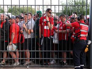 In this file photo taken on May 28, 2022 Liverpool fans stand outside unable to get in in time leading to the match being delayed prior to the UEFA Champions League final football match between Liverpool and Real Madrid at the Stade de France in Saint-Denis, north of Paris.  (Photo by THOMAS COEX / AFP) In this file photo taken on May 28, 2022 Liverpool fans stand outside unable to get in in time leading to the match being delayed prior to the UEFA Champions League final football match between Liverpool and Real Madrid at the Stade de France in Saint-Denis, north of Paris.  (Photo by THOMAS COEX / AFP)