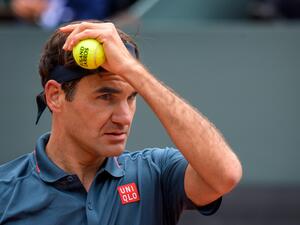 Switzerland's Roger Federer reacts during his ATP 250 Geneva Open tennis match against Spain's Pablo Andujar on May 18, 2021 in Geneva. / AFP / Fabrice COFFRINI