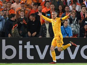 Wales' striker Gareth Bale celebrates after scoring his team's second goal during the UEFA Nations League - League A Group 4 football match between Netherlands and Wales at the Feyenoord "De Kuip" stadium in Rotterdam, on June 14, 2022. (Photo by JOHN THYS / AFP) Wales' striker Gareth Bale celebrates after scoring his team's second goal during the UEFA Nations League - League A Group 4 football match between Netherlands and Wales at the Feyenoord "De Kuip" stadium in Rotterdam, on June 14, 2022. (Photo by JOHN THYS / AFP)
