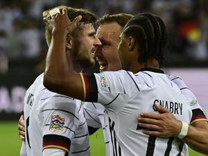 Germany's forward Timo Werner (L) celebrates scoring the 4-0 goal with his teammates during the UEFA Nations League football match Germany v Italy at the Borussia Park stadium in Moenchengladbach, western Germany, on June 14, 2022. (Photo by John MACDOUGALL / AFP) Germany's forward Timo Werner (L) celebrates scoring the 4-0 goal with his teammates during the UEFA Nations League football match Germany v Italy at the Borussia Park stadium in Moenchengladbach, western Germany, on June 14, 2022. (Photo by John MACDOUGALL / AFP)