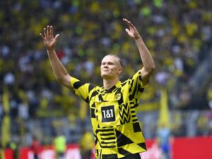 Dortmund's Norwegian forward Erling Braut Haaland reacts after his farewell before the German first division Bundesliga football match Borussia Dortmund v Hertha BSC Berlin in Dortmund, western Germany, on May 14, 2022. (Photo by INA FASSBENDER / AFP)  Dortmund's Norwegian forward Erling Braut Haaland reacts after his farewell before the German first division Bundesliga football match Borussia Dortmund v Hertha BSC Berlin in Dortmund, western Germany, on May 14, 2022. (Photo by INA FASSBENDER / AFP)
