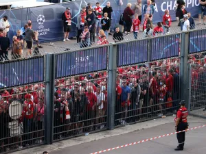  Liverpool fans stand outside unable to get in in time leading to the match being delayed prior to the UEFA Champions League final football match between Liverpool and Real Madrid at the Stade de France in Saint-Denis, north of Paris, on May 28, 2022. (Photo by Thomas COEX / AFP)