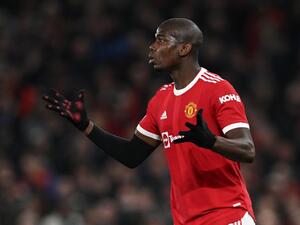 Manchester United's French midfielder Paul Pogba gestures during the UEFA Champions League round of 16 second leg football match between Manchester United and Atletico Madrid at Old Trafford stadium in Manchester, north west England on March 15, 2022. (Photo by Paul ELLIS / AFP) Manchester United's French midfielder Paul Pogba gestures during the UEFA Champions League round of 16 second leg football match between Manchester United and Atletico Madrid at Old Trafford stadium in Manchester, north west England on March 15, 2022. (Photo by Paul ELLIS / AFP)