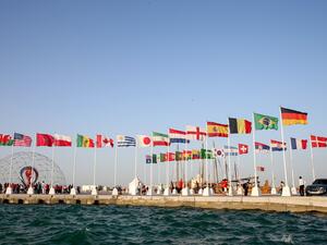A general view shows flags of the qualified countries for the 2022 World Cup in the Qatari capital Doha during a flag-raising ceremony of the last remaining countries to qualify, on June 16, 2022. (Photo by Mustafa ABUMUNES / AFP) A general view shows flags of the qualified countries for the 2022 World Cup in the Qatari capital Doha during a flag-raising ceremony of the last remaining countries to qualify, on June 16, 2022. (Photo by Mustafa ABUMUNES / AFP)