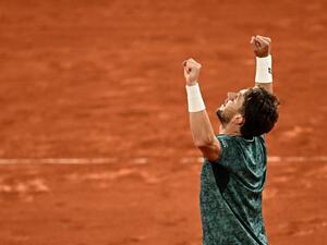 Norway's Casper Ruud reacts after winning against Croatia's Marin Cilic at the end of their men's semi-final singles match on day thirteen of the Roland-Garros Open tennis tournament at the Court Philippe-Chatrier in Paris on June 3, 2022. (Photo by Anne-Christine POUJOULAT / AFP) Norway's Casper Ruud reacts after winning against Croatia's Marin Cilic at the end of their men's semi-final singles match on day thirteen of the Roland-Garros Open tennis tournament at the Court Philippe-Chatrier in Paris on June 3, 2022. (Photo by Anne-Christine POUJOULAT / AFP)