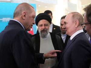 (From L) Erdogan, Raisi and Putin