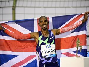 Britain's Mo Farah celebrates after victory and a world record in the men's one hour event at The Diamond League AG Memorial Van Damme athletics meeting at The King Baudouin Stadium in Brussels on September 4, 2020. / AFP / MARTIN BUREAU Britain's Mo Farah celebrates after victory and a world record in the men's one hour event at The Diamond League AG Memorial Van Damme athletics meeting at The King Baudouin Stadium in Brussels on September 4, 2020. / AFP / MARTIN BUREAU