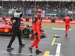 Ferrari's Spanish driver Carlos Sainz Jr reacts after the third and final qualifying session for the Formula One British Grand Prix at the Silverstone motor racing circuit in Silverstone, central England on July 2, 2022. (Photo by JUSTIN TALLIS / AFP) Ferrari's Spanish driver Carlos Sainz Jr reacts after the third and final qualifying session for the Formula One British Grand Prix at the Silverstone motor racing circuit in Silverstone, central England on July 2, 2022. (Photo by JUSTIN TALLIS / AFP)