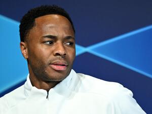 Manchester City's English midfielder Raheem Sterling attends a press conference at the Manchester City training ground in Manchester, north west England, on April 25, 2022, on the eve of their UEFA Champions League semi-final first leg football match against Real Madrid. (Photo by Oli SCARFF / AFP) Manchester City's English midfielder Raheem Sterling attends a press conference at the Manchester City training ground in Manchester, north west England, on April 25, 2022, on the eve of their UEFA Champions League semi-final first leg football match against Real Madrid. (Photo by Oli SCARFF / AFP)