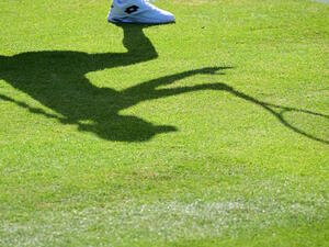 The shadow of Belgium's Elise Mertens is pictured as she returns the ball to Colombia's Camila Osorio during their women's singles tennis match on the first day of the 2022 Wimbledon Championships at The All England Tennis Club in Wimbledon, southwest London, on June 27, 2022. (Photo by SEBASTIEN BOZON / AFP) The shadow of Belgium's Elise Mertens is pictured as she returns the ball to Colombia's Camila Osorio during their women's singles tennis match on the first day of the 2022 Wimbledon Championships at The All England Tennis Club in Wimbledon, southwest London, on June 27, 2022. (Photo by SEBASTIEN BOZON / AFP)