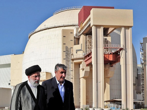 Ebrahim Raisi (L) and atomic energy chief Mohammad Eslami, visiting the Bushehr Nuclear Power Plant