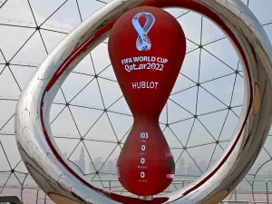 A partial view shows the Qatar 2022 FIFA World Cup countdown clock in Doha on August 10, 2022. (Photo by MUSTAFA ABUMUNES / AFP)