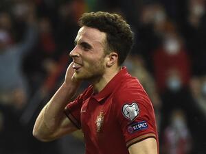 Portugal's forward Diogo Jota celebrates after scoring a goal during the World Cup 2022 qualifying semi-final first leg football match between Portugal and Turkey at the Dragao stadium in Porto on March 24, 2022. (Photo by MIGUEL RIOPA / AFP)
