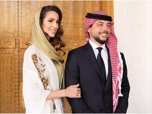 الأمير الحسين بن عبدالله والآنسة رجوة (المصدر: الديوان الملكي الأردني)