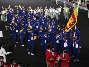 Athletes for Team Sri Lanka take part in the opening ceremony for the Commonwealth Games at the Alexander Stadium in Birmingham, central England, on July 28, 2022. (Photo by Glyn KIRK / AFP)