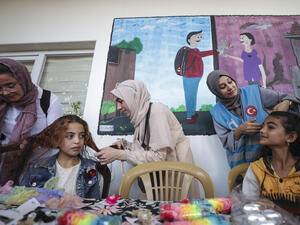 Braiding Their hairs 