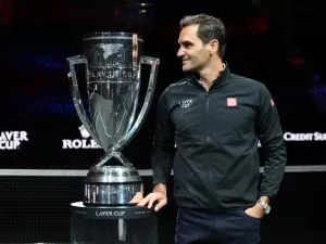 Roger Federer poses for a photograph with the Laver Cup Trophy after taking part in a live TV interview on CNBC at TD Garden on September 24, 2021 in Boston, Massachusetts. Clive Brunskill/Getty Images for Laver Cup/AFP (Photo by CLIVE BRUNSKILL / GETTY IMAGES NORTH AMERICA / Getty Images via AFP)