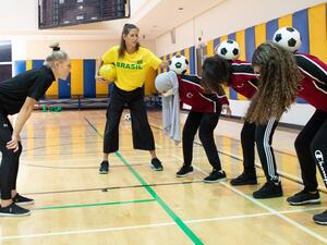 QF Students Learn To Express Themselves – Using a Football