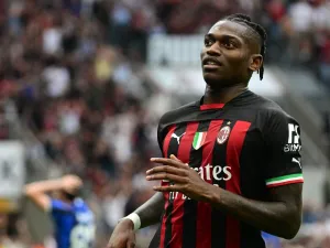 AC Milan's Portuguese forward Rafael Leao reacts after scoring during the Italian Serie A football match between AC Milan and Inter Milan at the San Siro stadium in Milan on September 3, 2022. (Photo by Miguel MEDINA / AFP)