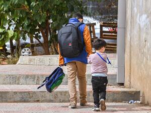 Introducing English would be a challenge to teachers and students 