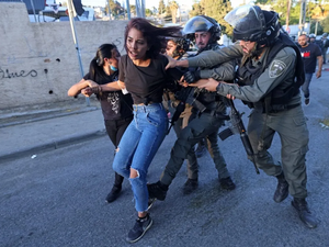 Palestinian woman treated roughly by Israeli soldiers  