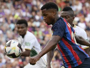 Barcelona's Spanish midfielder Ansu Fati prepares to shoot the ball during the Spanish League football match between FC Barcelona and Elche CF at the Camp Nou stadium in Barcelona on September 17, 2022. (Photo by Josep LAGO / AFP)