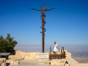 Serpentine Cross at the top of Mount Nebo in Jordan, place where Moses viewed the Holy Land