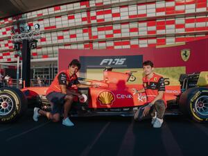 Scuderia Ferrari F1 drivers Charles Leclerc and Carlos Sainz surprise guests at the Ferrari World Abu Dhabi F1 FanZone 