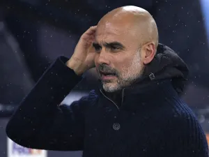 Manchester City's Spanish manager Pep Guardiola looks on ahead of the UEFA Champions League group G football match between Manchester City and Sevilla at the Etihad Stadium in Manchester, north west England on November 2, 2022. (Photo by Oli SCARFF / AFP)