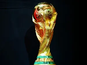 This photograph taken on October 7, 2022 shows the FIFA World Cup trophy displayed during the FIFA World Cup Trophy Tour, in Paris. The 2022 FIFA World Cup will be held from November 20 to December 18, 2022, in Doha. (Photo by FRANCK FIFE / AFP)