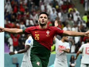 Portugal's forward #26 Goncalo Ramos celebrates scoring his team's fifth goal, his hat-trick, during the Qatar 2022 World Cup round of 16 football match between Portugal and Switzerland at Lusail Stadium in Lusail, north of Doha on December 6, 2022. (Photo by Jewel SAMAD / AFP)