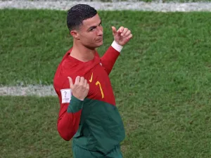 Portugal's forward #07 Cristiano Ronaldo prepares to come on during the Qatar 2022 World Cup round of 16 football match between Portugal and Switzerland at Lusail Stadium in Lusail, north of Doha on December 6, 2022. (Photo by ADRIAN DENNIS / AFP)