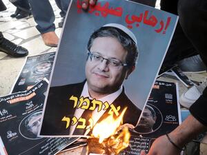 Palestinians burn a portrait of far-right Israeli MP Itamar Ben Gvir