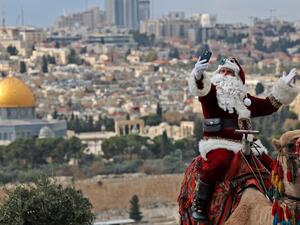 Iss Kassissieh as Santa Claus