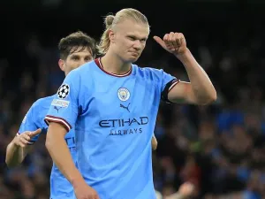 Manchester City's Norwegian striker Erling Haaland celebrates his goal during the UEFA Champions League group G football match between England's Manchester City and Germany's Borussia Dortmund at the Etihad Stadium in Manchester on September 14, 2022. (Photo by Lindsey Parnaby / AFP)