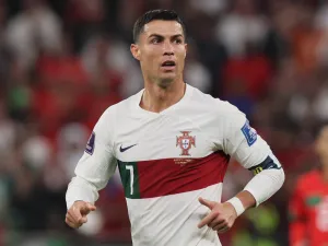 Portugal's forward #07 Cristiano Ronaldo reacts during the Qatar 2022 World Cup quarter-final football match between Morocco and Portugal at the Al-Thumama Stadium in Doha on December 10, 2022. (Photo by KARIM JAAFAR / AFP)