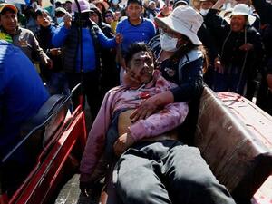 قتلى وجرحى في صدامات بين قوات الأمن ومتظاهرين مناهضين للرئيسة دينا بولوارتي في البيرو 