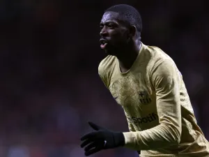 Barcelona's French forward Ousmane Dembele celebrates scoring the opening goal during the Spanish League football match between Club Atletico de Madrid and FC Barcelona at the Wanda Metropolitano stadium in Madrid on January 8, 2023. (Photo by Pierre-Philippe Marcou / AFP)