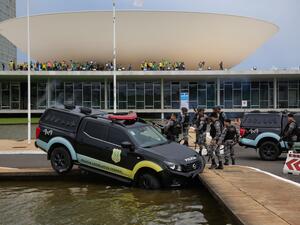 جانب من أحداث الشغب التي وقعت في العاصمة البرازيلية (أ ف ب)