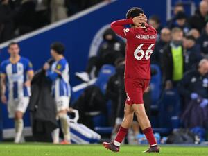 Liverpool's English defender Trent Alexander-Arnold reacts on the final whistle in the English Premier League football match between Brighton and Hove Albion and Liverpool at the American Express Community Stadium in Brighton, southern England on January 14, 2023. Brighton won the game 3-0. (Photo by Glyn KIRK / AFP)