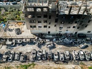 Israeli settlers raze Palestinian town in the West Bank.