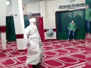 Imam playing football in a mosque 