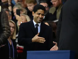 Paris Germain's Qatari president Nasser Al-Khelaïfi is greeted before the French L1 football match between Paris Saint-Germain (PSG) and OGC Nice at The Parc des Princes Stadium in Paris on October 1, 2022. (Photo by FRANCK FIFE / AFP)