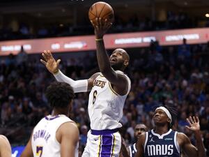 LeBron James #6 of the Los Angeles Lakers puts up a shot and scores against the Dallas Mavericks in the second half at American Airlines Center on February 26, 2023 in Dallas, Texas. The Lakers won 111-108. Ron Jenkins/Getty Images/AFP (Photo by Ron Jenkins / GETTY IMAGES NORTH AMERICA / Getty Images via AFP)