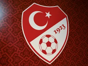 This picture taken on September 20, 2021 in Istanbul shows a logo of Turkish Football Federation (TFF) on a wall of its headquarters. (Photo by Ozan KOSE / AFP)