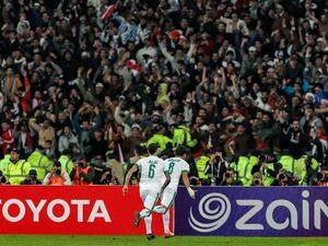 (Photo by Hussein Faleh / AFP)