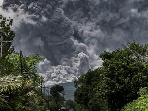 Thick smoke rises during an eruption from Mount Merapi, Indonesia’s most active volcano